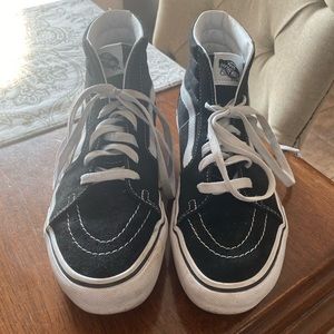 High top vans off the wall